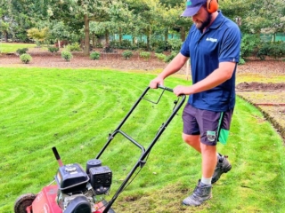 Total Lawn Solutions beginning the mowing task